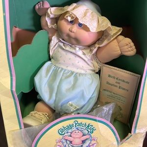 Little girl Cabbage Patch preemie doll